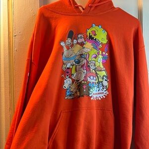 Bright Orange Sweater with Colorful Graphic Design and Hood